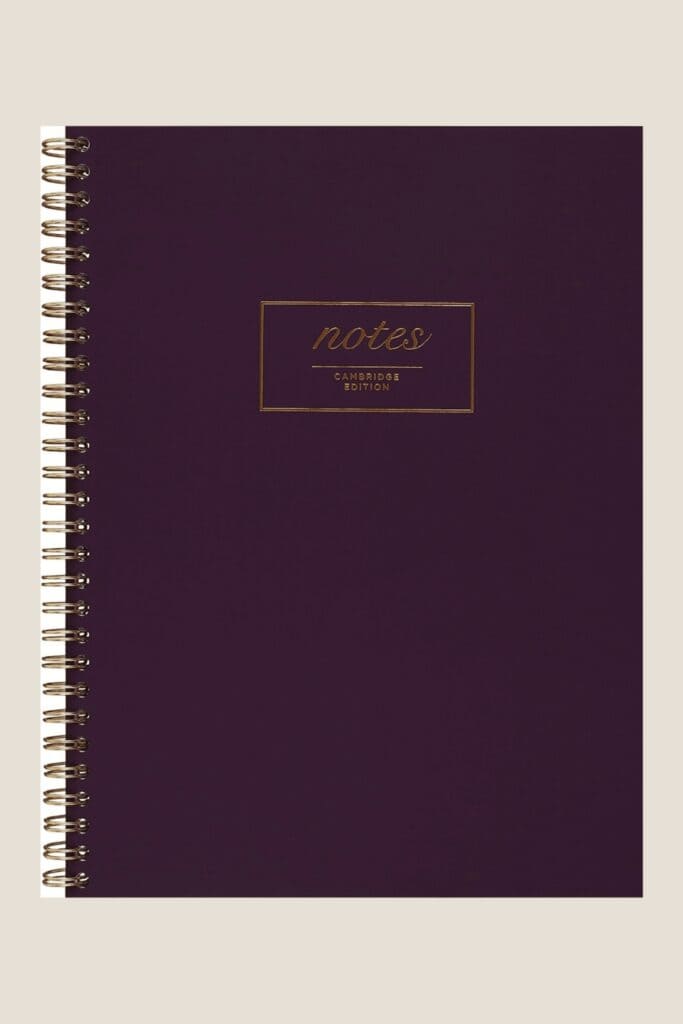 cambridge notebook with a purple cover