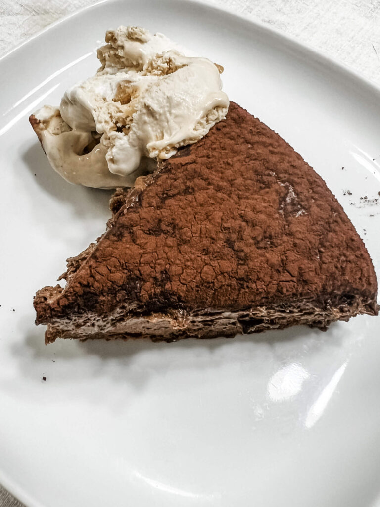 a piece of the best chocolate and vanilla ice cream of the best chocolate cake in lisbon