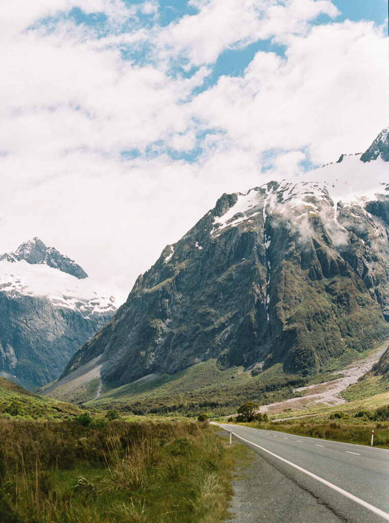 a road with mountains