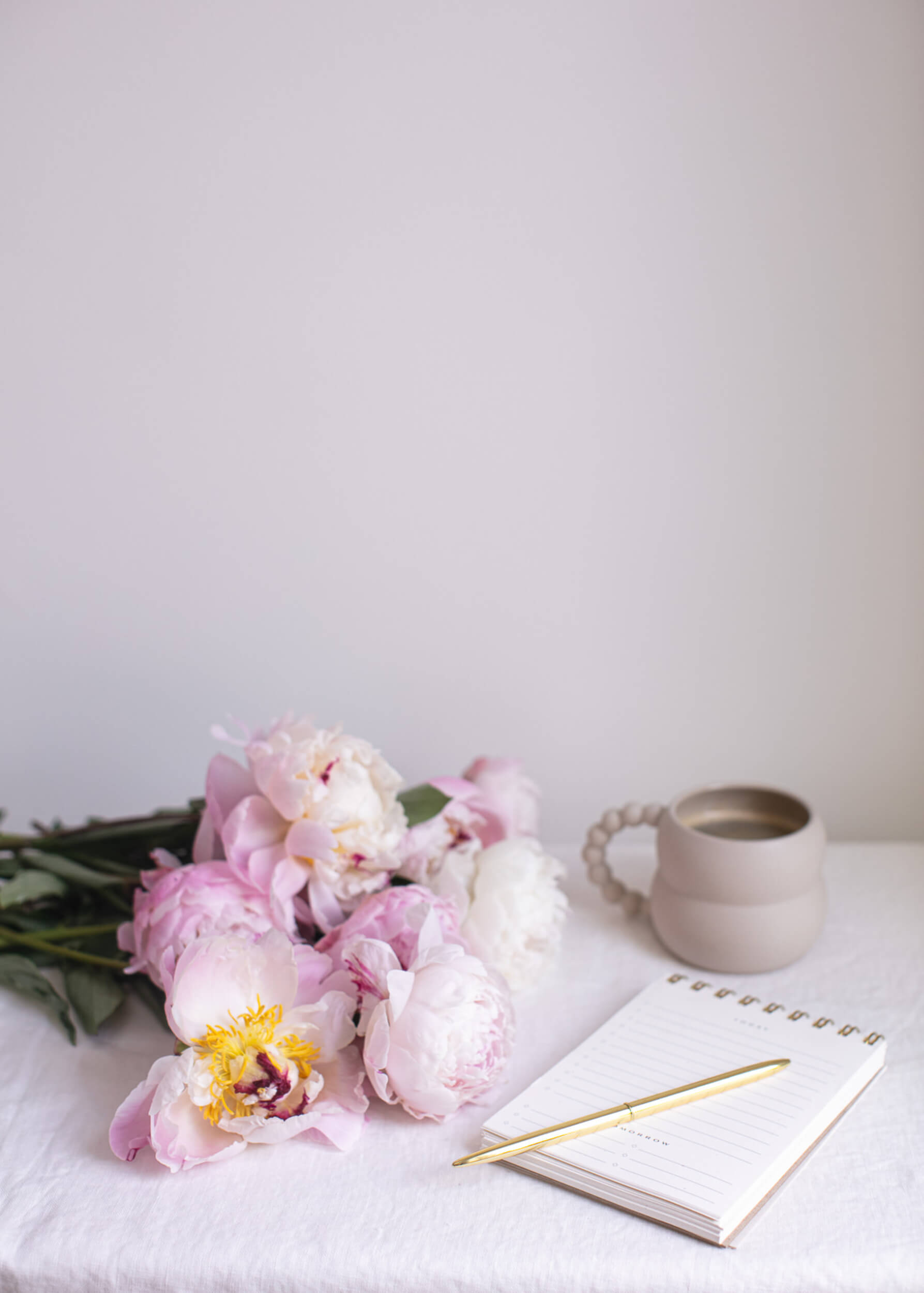 flowers coffee and notebook