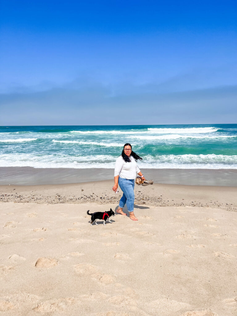 Isabel with Pepe on the beach