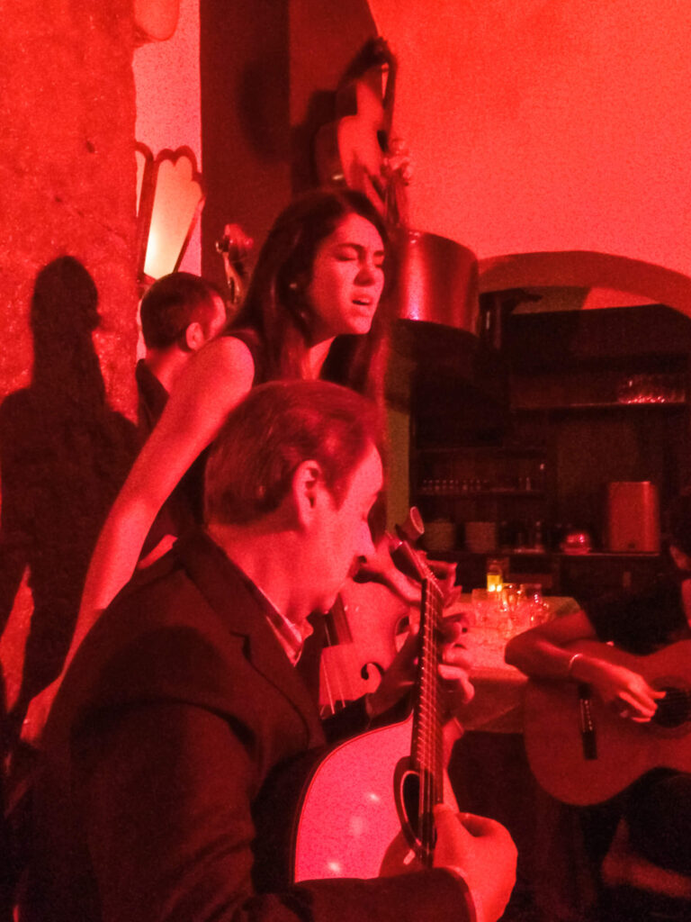 a fadista singing in alfama