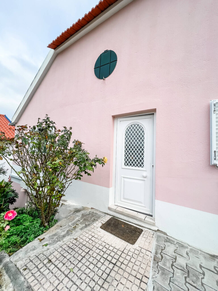 The front entrance of our apartment in our pink barn