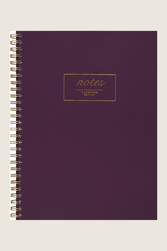 cambridge notebook with a purple cover